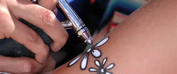 Understanding Airbrush Tattoo Paints: Water-Based vs. Alcohol-Based